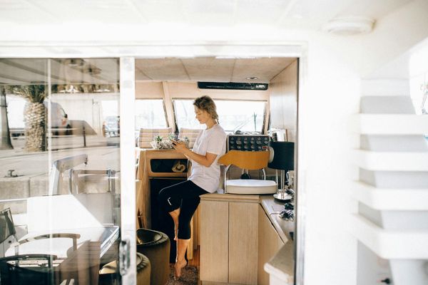 View from a window overlooking a calm park, ideal for outdoor exercise.